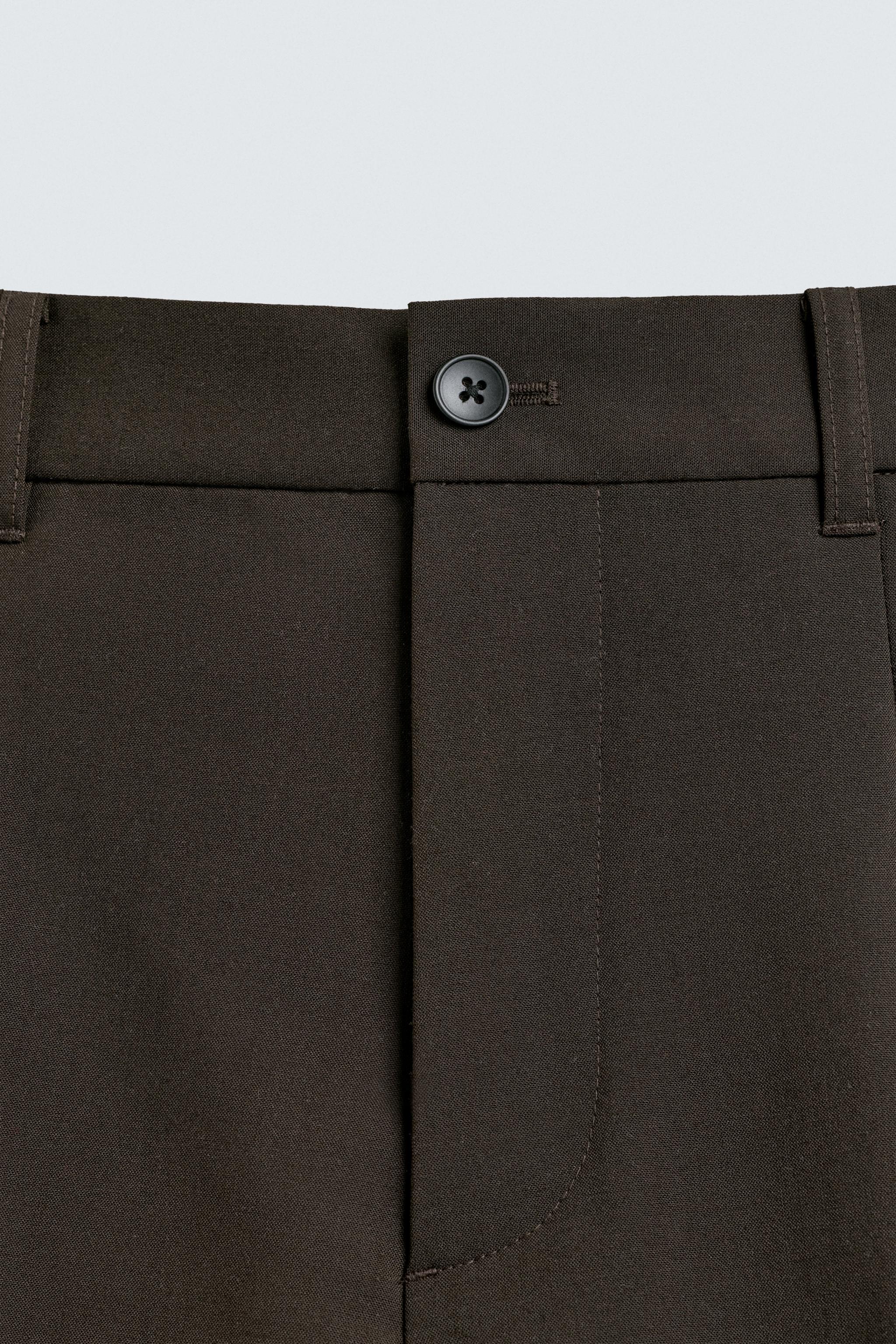 PANTALON COUPE LARGE À PLIS